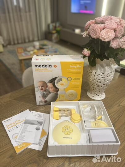 Молокоотсос medela swing flex электрический