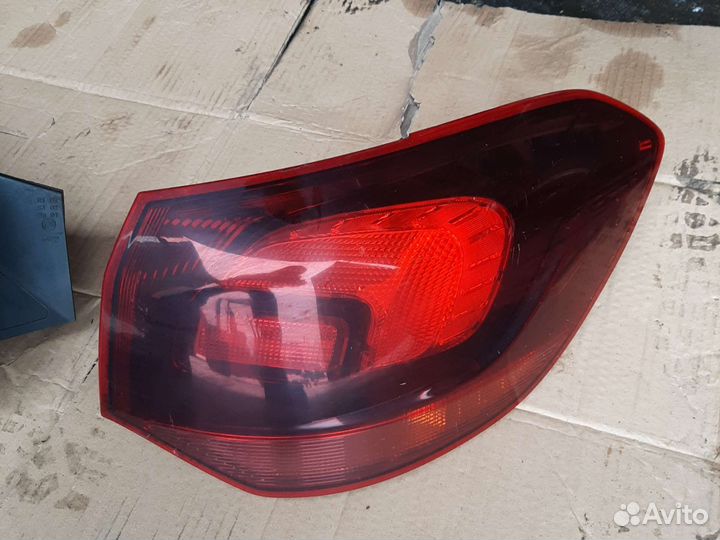 Фонарь Опель Астра J джей универсал