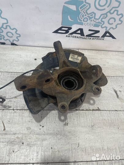 Кулак передний правый Kia Cerato 3