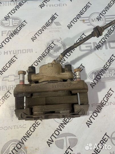 Суппорт тормозной передний правый Renault Duster 1