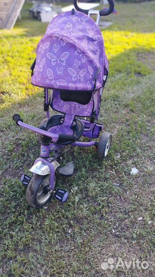 Трехколесный велосипед с ручкой