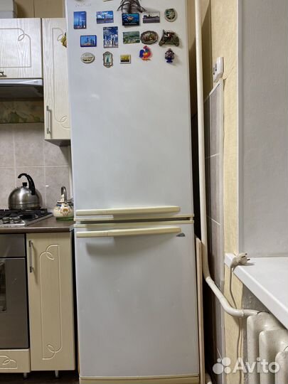 Холодильник бу позис