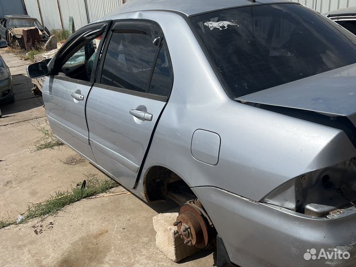 Задний бампер lancer 9