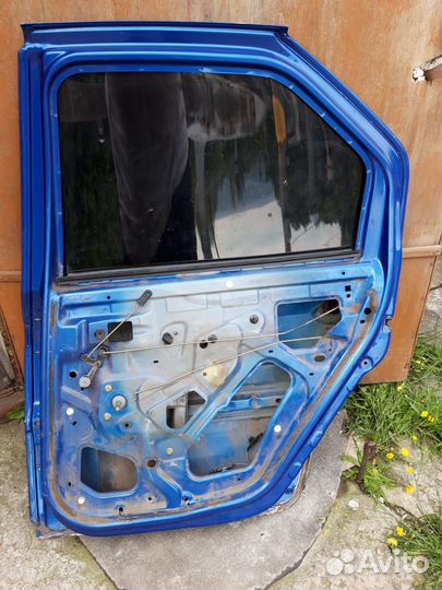 Дверь задняя правая renault logan 1