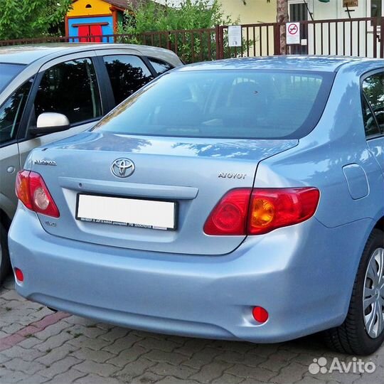 Бампер задний в цвет Toyota Corolla E150
