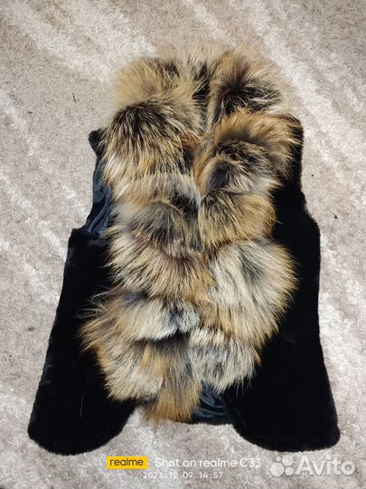 Меховая жилетка