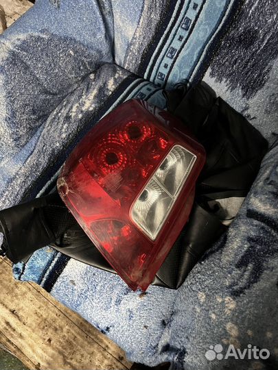 Фонарь задний левый Лачетти седан