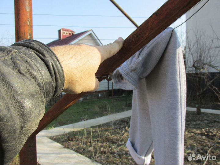 Вращающаяся сушилка для белья уличная