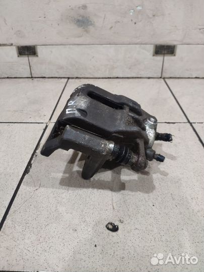 Тормозной суппорт передний правый LADA Vesta