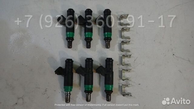 Форсунка топливная Ауди 06C133551