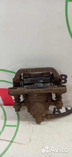 Суппорт задний правый Nissan Qashqai J10 HR16DE