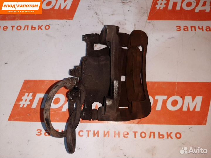 Суппорт тормозной передний левый Nissan X-Trail