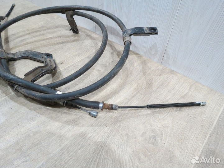 Трос стояночного тормоза Kia Rio 3