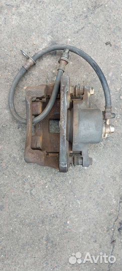 Суппорт левый Toyota Corolla, Fielder, Allex-Runx