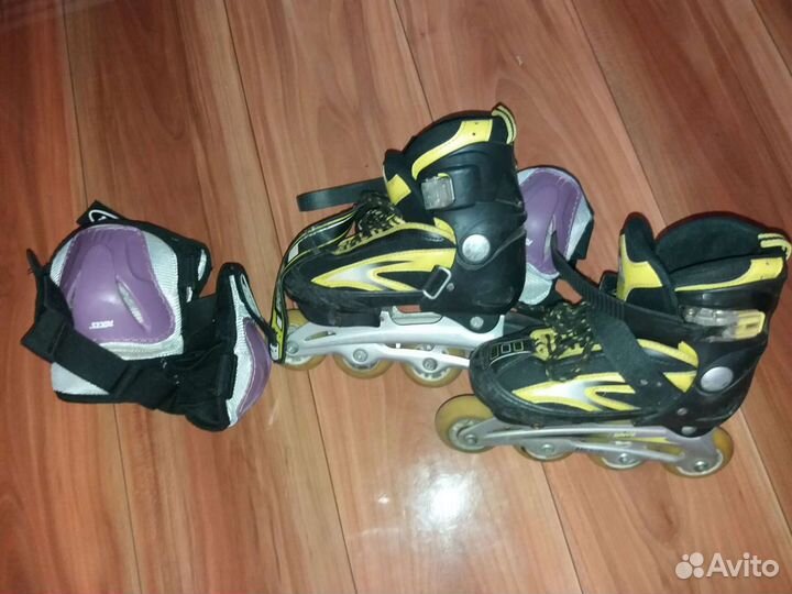 Роликовые коньки