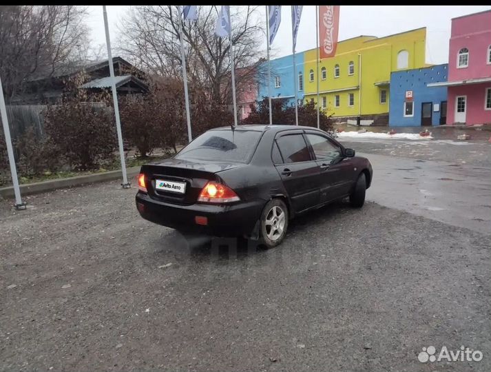 Mitsubishi Lancer 1.6 МТ, 2004, битый, 450 000 км