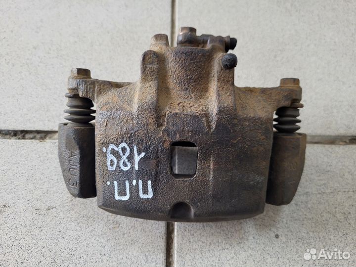 Суппорт тормозной передний Mitsubishi Lancer IX