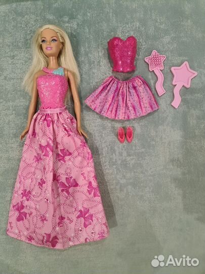 Лот одежды, обуви и аксессуаров для кукол Барби