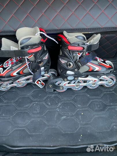 Роликовые коньки