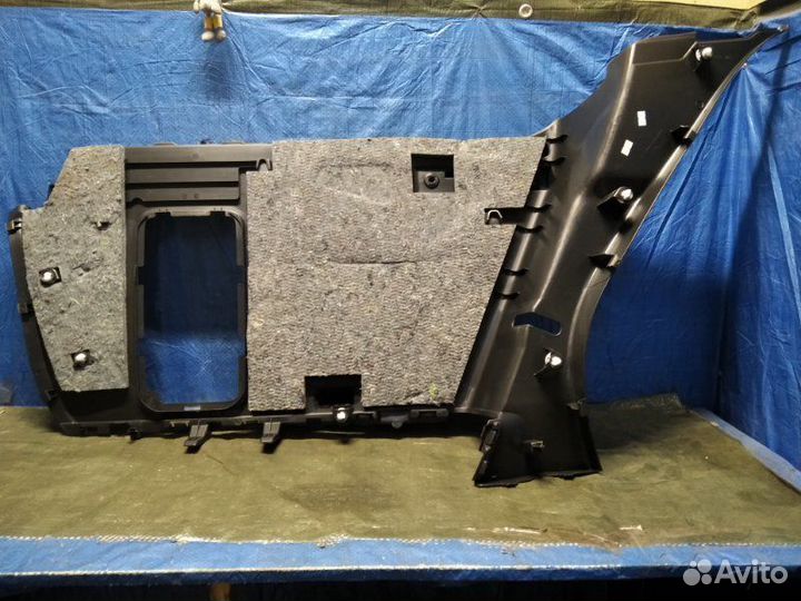 Обшивка багажника боковая задняя левая Renault