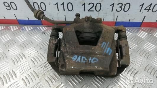 Суппорт тормозной передний правый opel astra J (9A