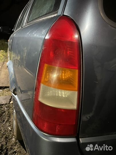 Фонарь левый Opel Astra G Универсал