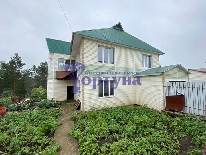 Коттедж 313 м² на участке 11 сот.