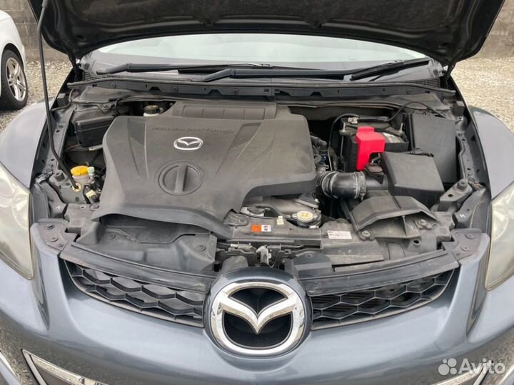 В разборе Mazda CX-7 (ER) 2011г. рестайлинг