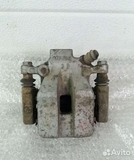 Суппорт задний левый Toyota Camry 50 55