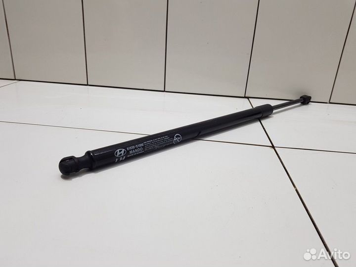 Амортизатор багажника левый (Hyundai Santa Fe IV)