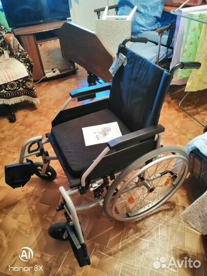 Инвалидная коляска новая