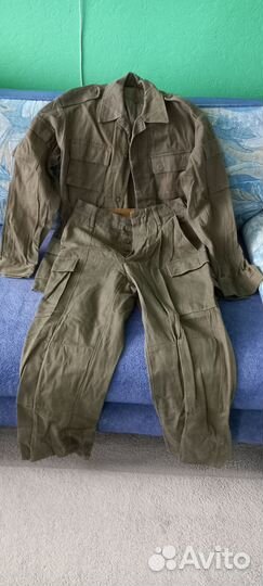 Костюмы камуфлированные, плащ-накидка, шапки и пр