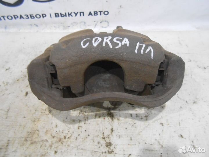 Передний левый суппорт Opel Corsa D 1,4л АКПП