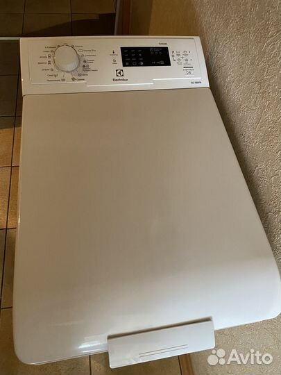 Стиральная машина с вертикальной загрузкой