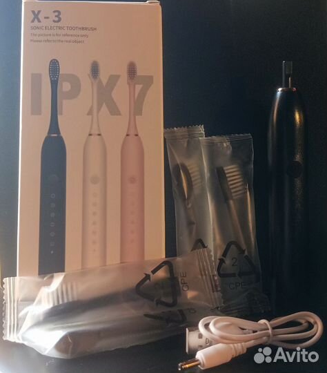 Электрическая зубная щетка