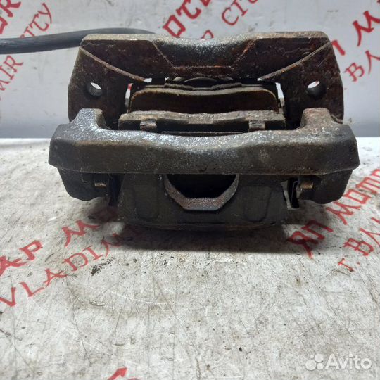 Суппорт тормозной задний правый Mazda Cx7 CBA 2.3