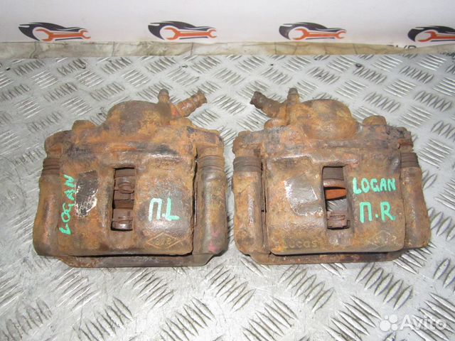 Суппорт тормозной передний Renault Logan 2005-2014