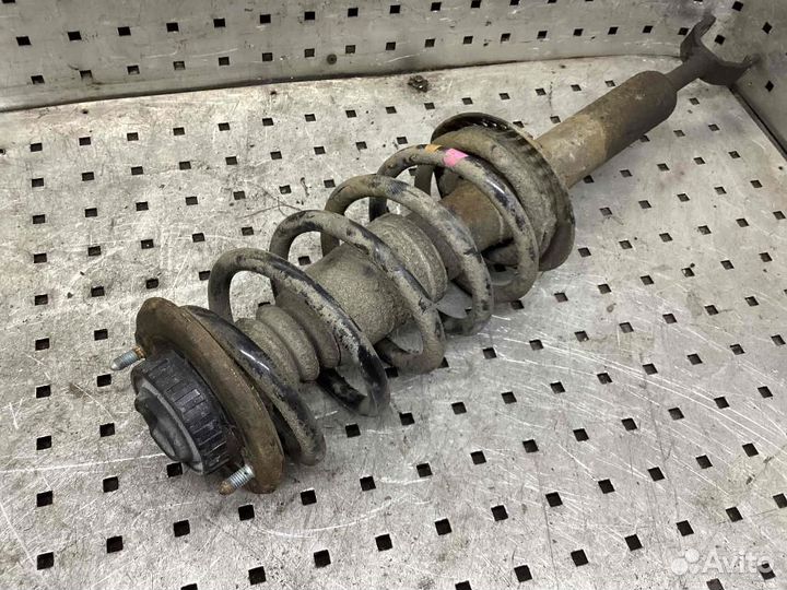 Амортизатор/стойка передняя левая Volkswagen Passa