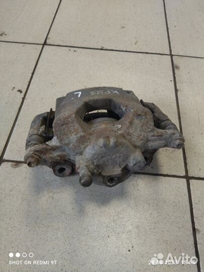 Суппорт тормозной передний левый Chevrolet Cruze