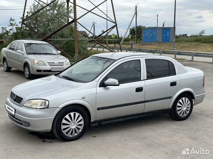 Opel Astra 2.0 МТ, 1999, 209 000 км
