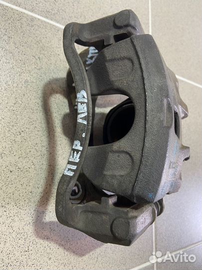 Суппорт передний левый Kia Sportage 2006