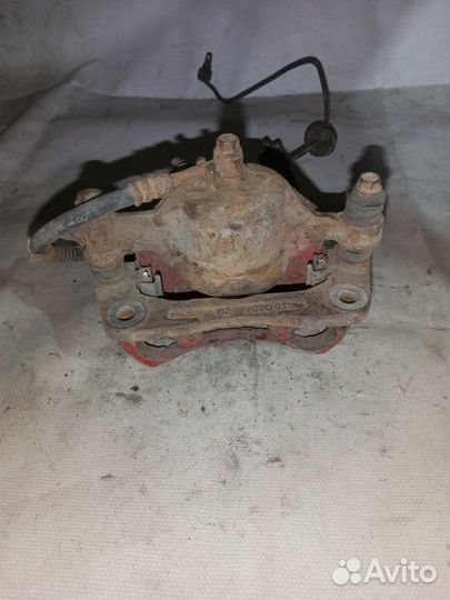 Суппорт тормозной передний левый Hyundai Accent