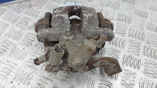 Суппорт тормозной задний правый toyota corolla E15