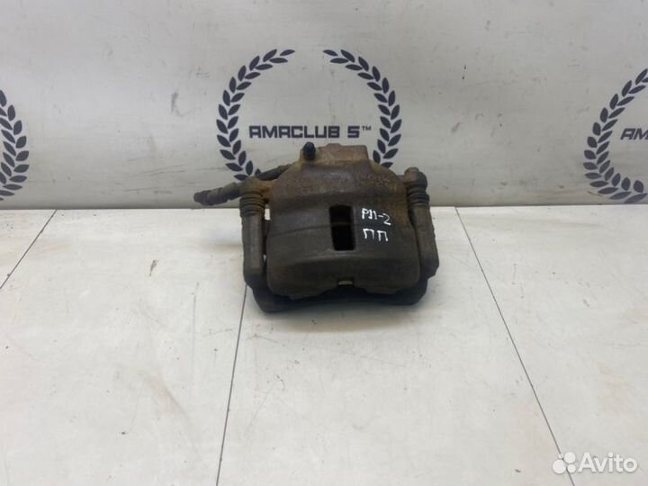 Суппорт передний правый Nissan Primera P11 1.6