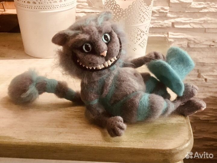 Чеширский кот из Асилы в стране Чудес