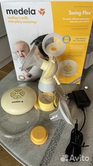 Молокоотсос medela электрический