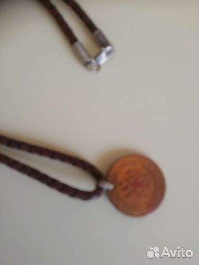 Монета 2 коп. 1912 года, на кожаном шнурке