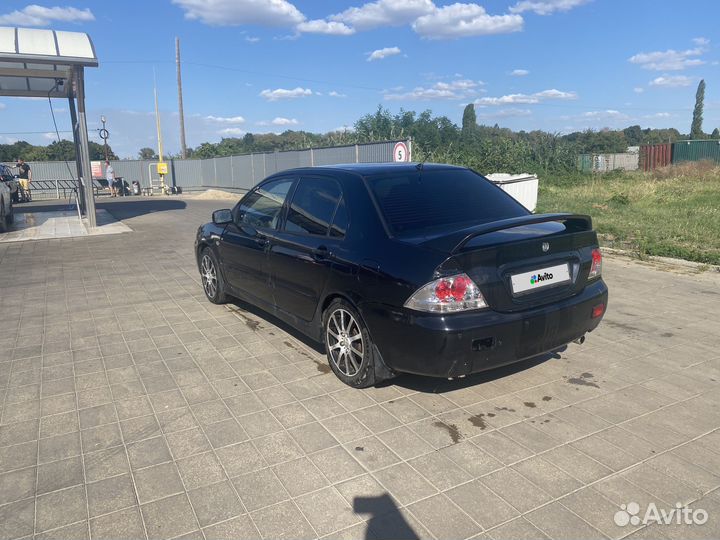 Mitsubishi Lancer 2.0 МТ, 2005, 215 000 км