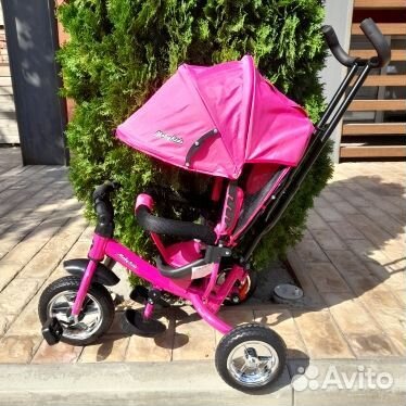 Трехколесный велосипед розовый
