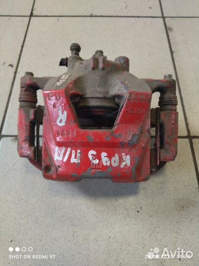 Суппорт тормозной передний правый Chevrolet Cruze